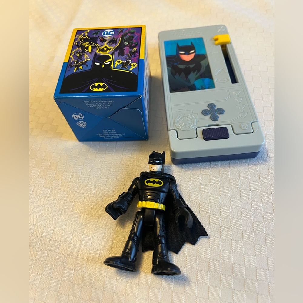 Three Batman toys